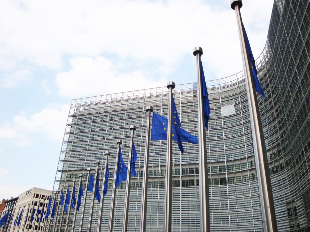 The European Commission headquarters, the Berlaymont building, in Brussels — home of the EU body that selected the EUROPA consortium to build Europe's first open-source frontier AI model