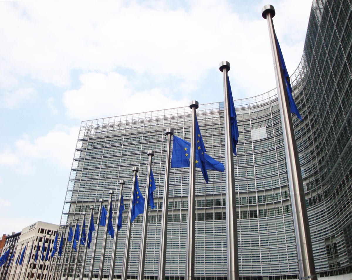 The European Commission headquarters, the Berlaymont building, in Brussels — home of the EU body that selected the EUROPA consortium to build Europe's first open-source frontier AI model