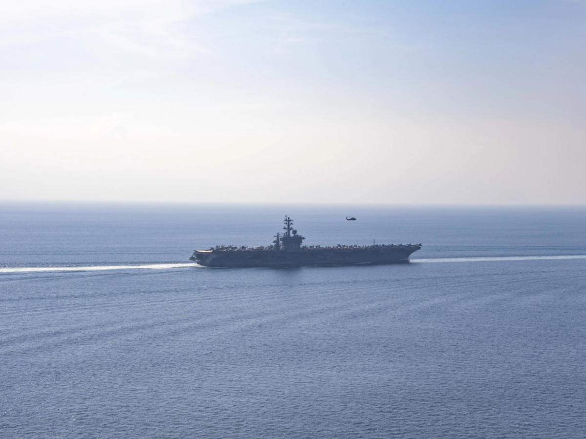 USS Dwight D. Eisenhower aircraft carrier transiting the Strait of Hormuz in November 2023