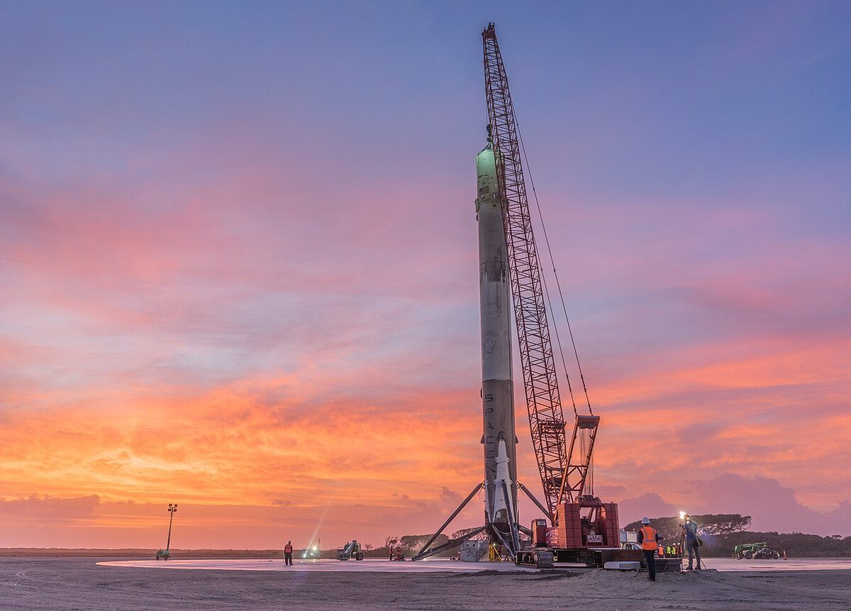 SpaceX Falcon 9 first stage booster after landing at Landing Zone 1