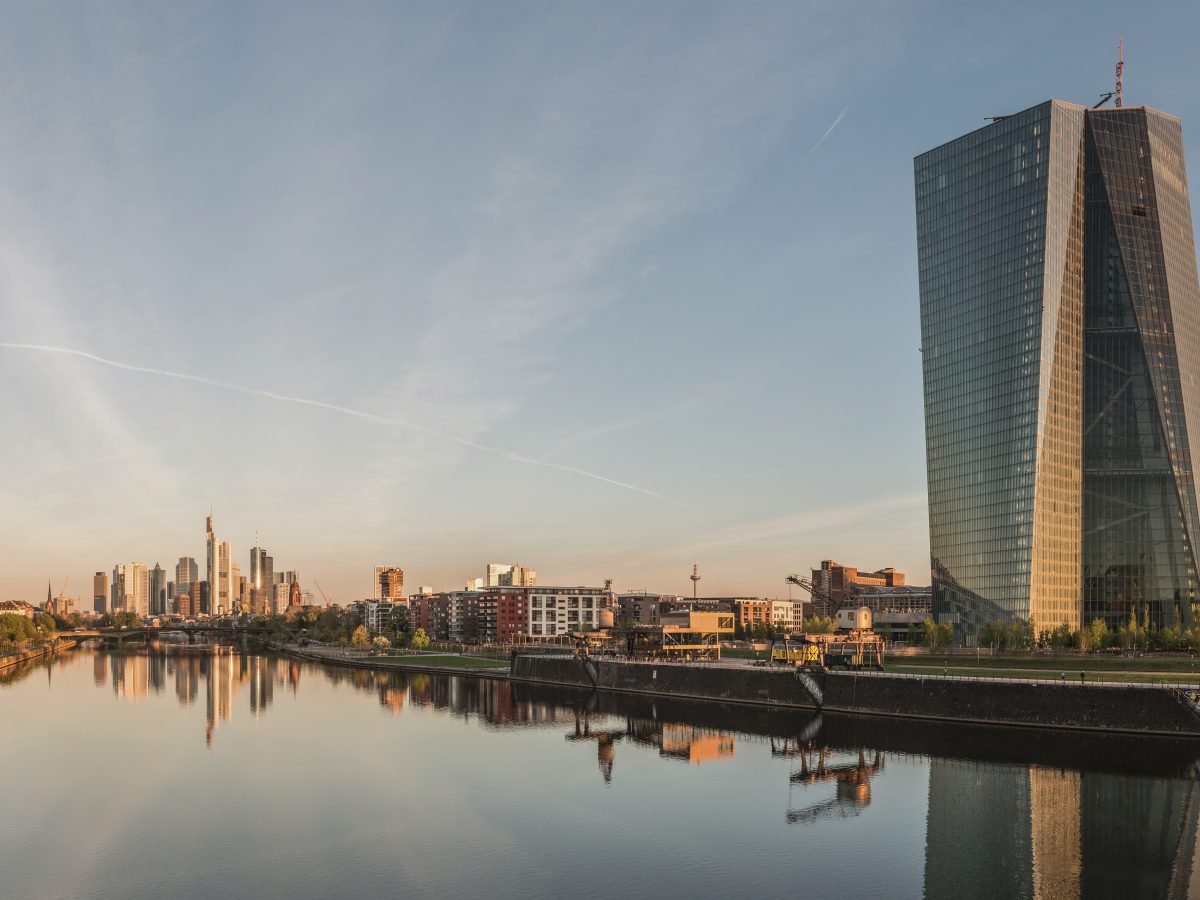 The European Central Bank headquarters and Frankfurt skyline at dawn