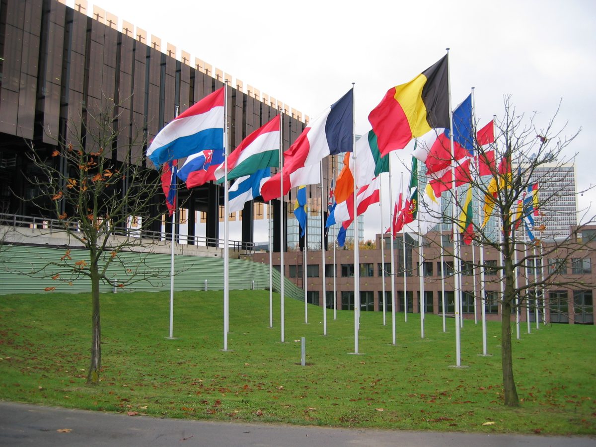 European Court of Justice building in Luxembourg City with EU flags