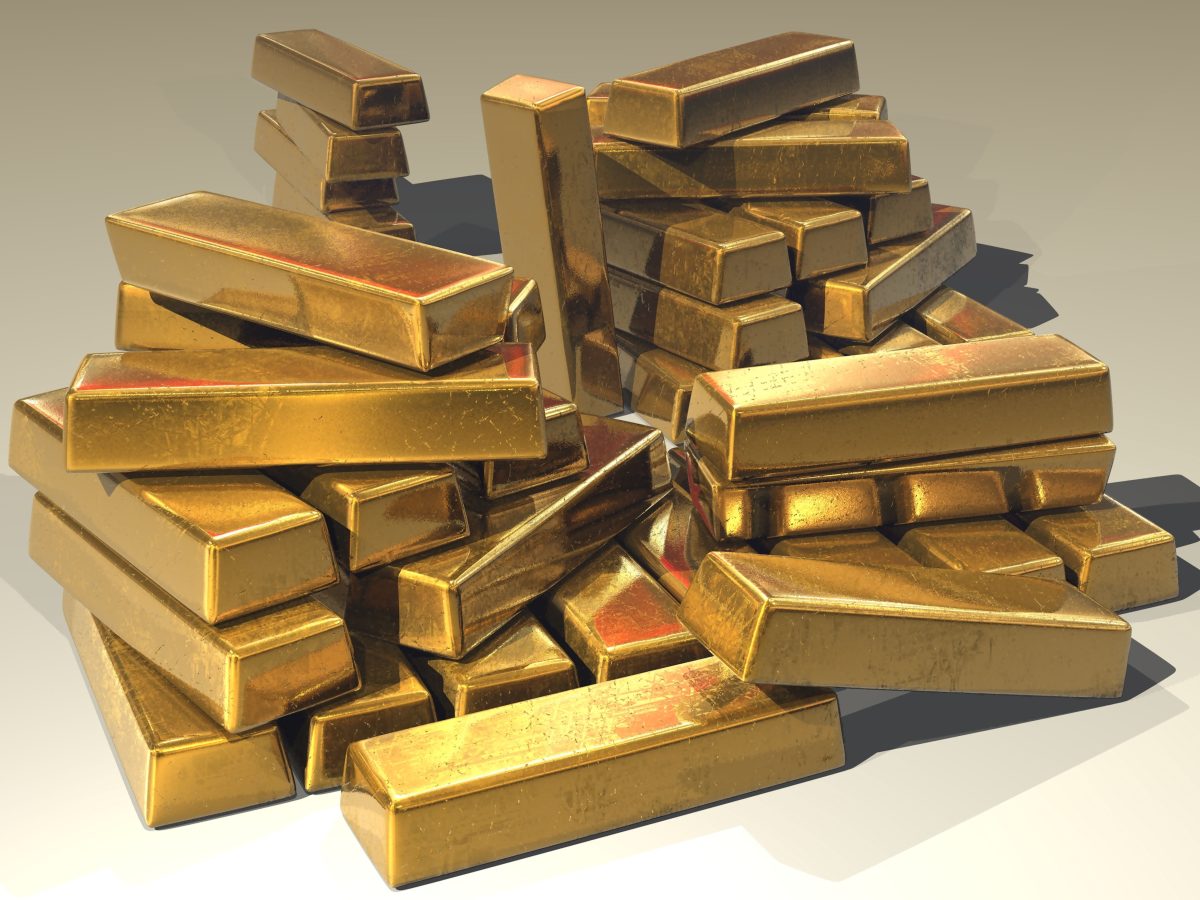 Gold bullion bars stacked, representing precious metals market