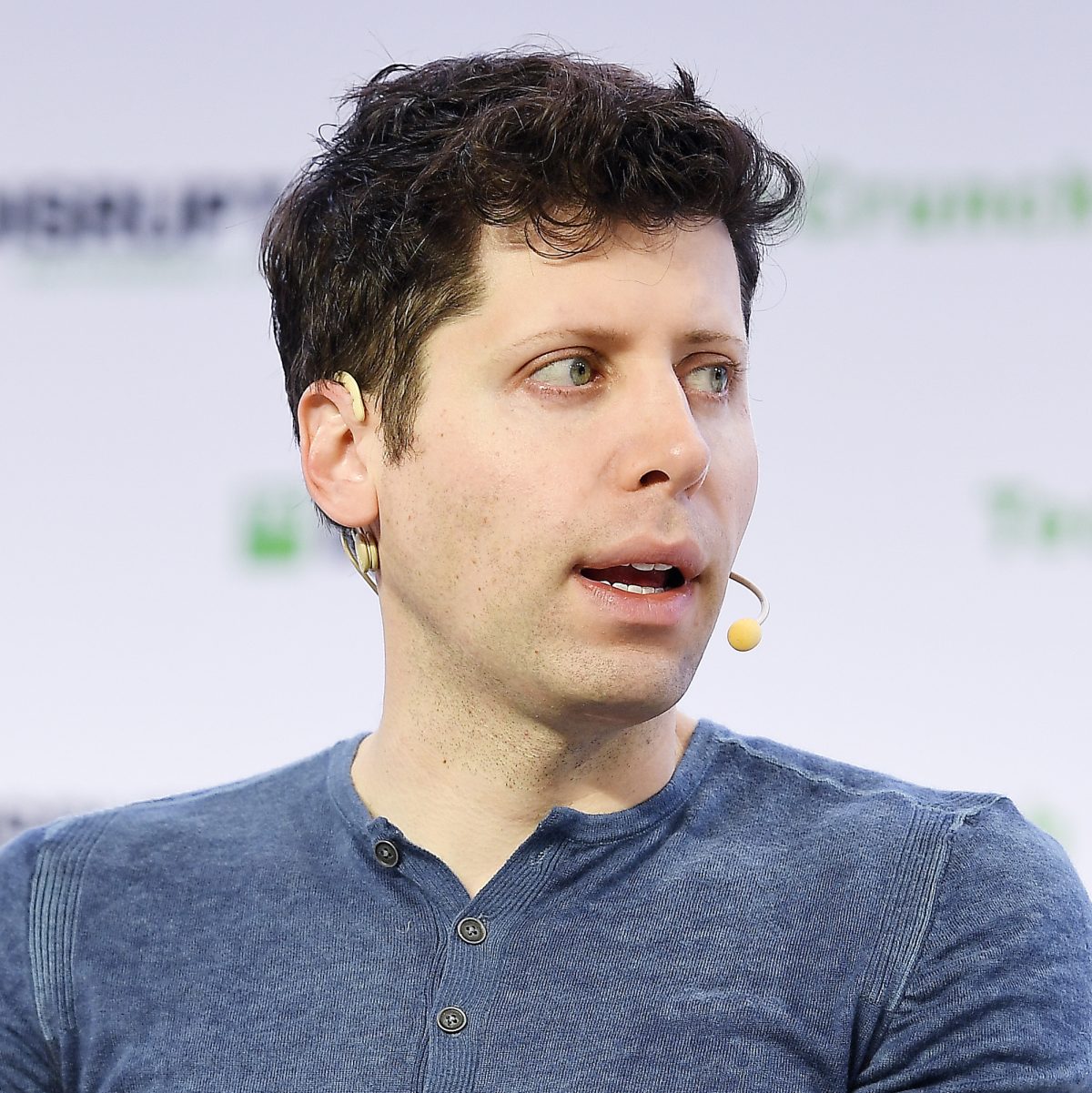 OpenAI CEO Sam Altman speaking at a conference
