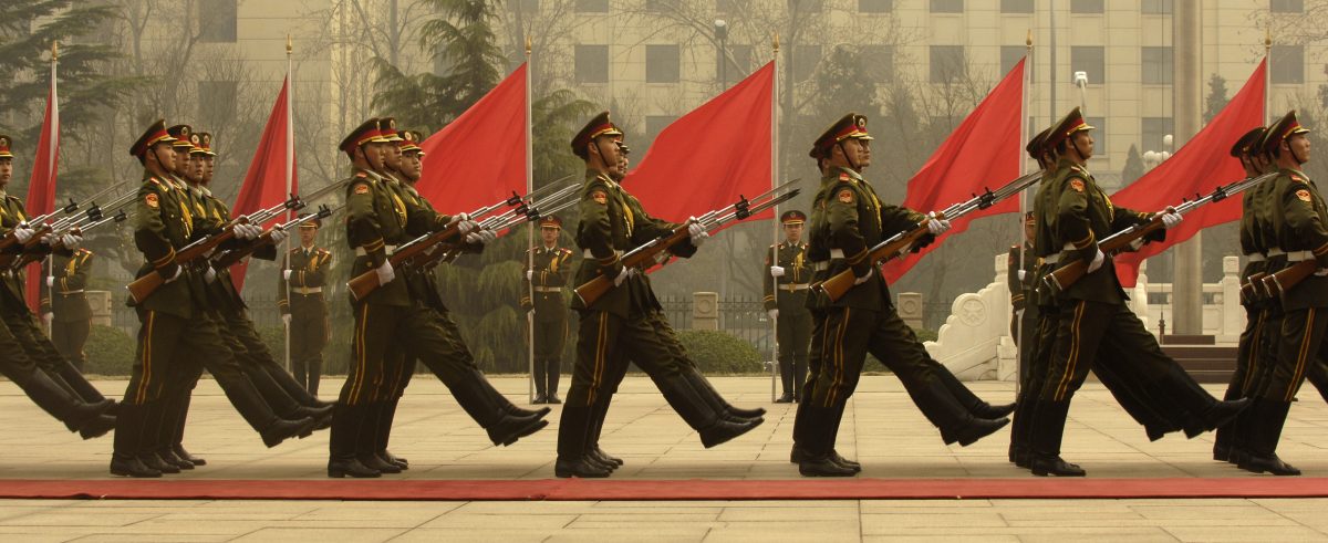 Chinese PLA honor guard soldiers march in Beijing at a military ceremony