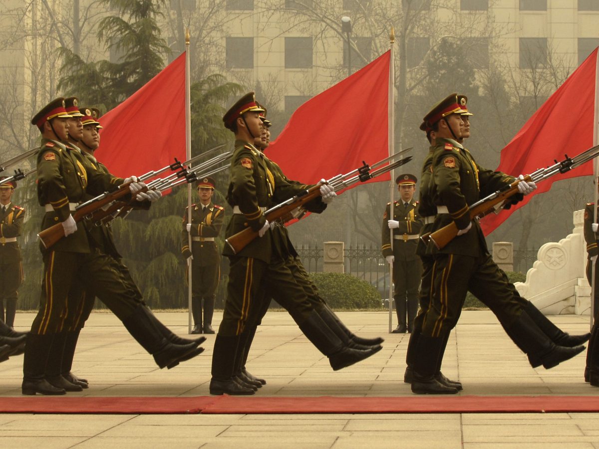 Chinese PLA honor guard soldiers march in Beijing at a military ceremony