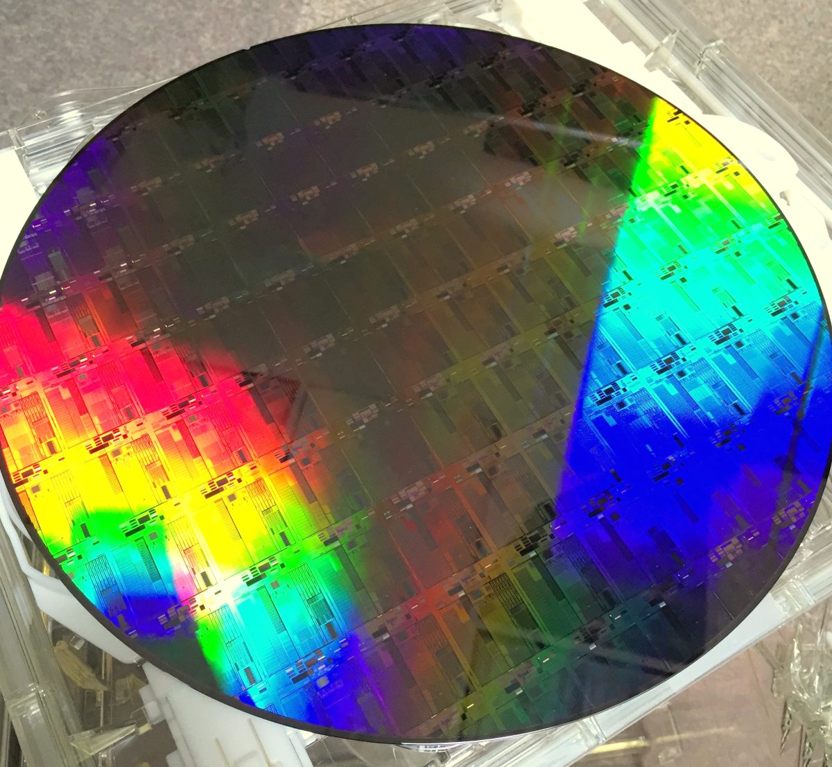 A 300mm silicon photonics wafer used in semiconductor chip manufacturing