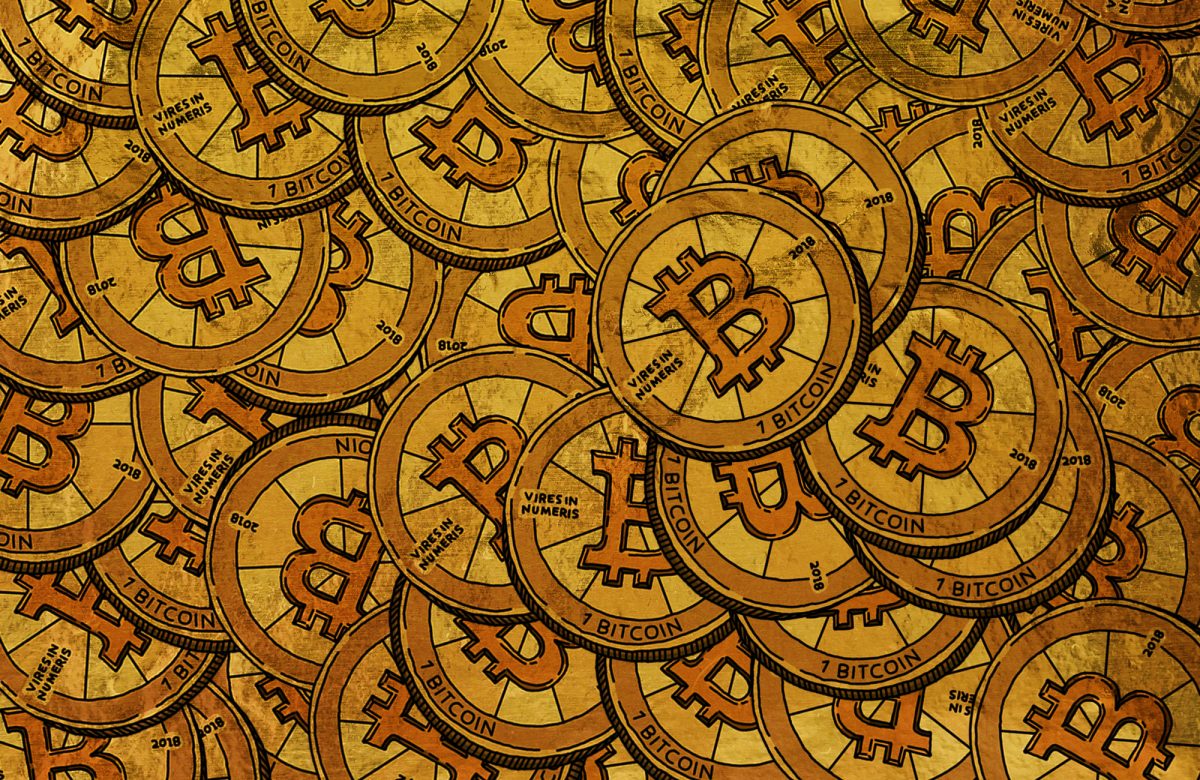 Bitcoin and cryptocurrency coins on dark background