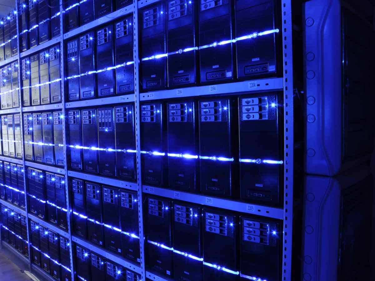 Server room representing AI infrastructure and data center operations