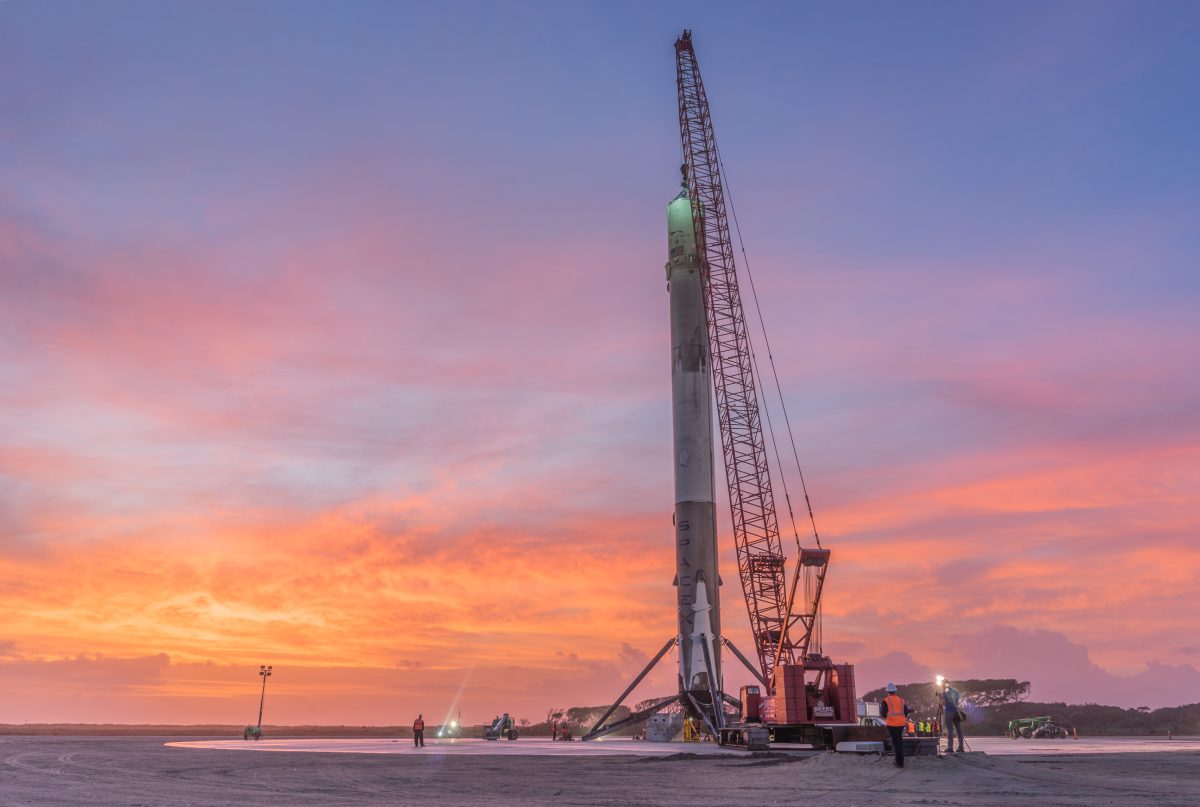 SpaceX Falcon 9 first stage booster after landing at Landing Zone 1