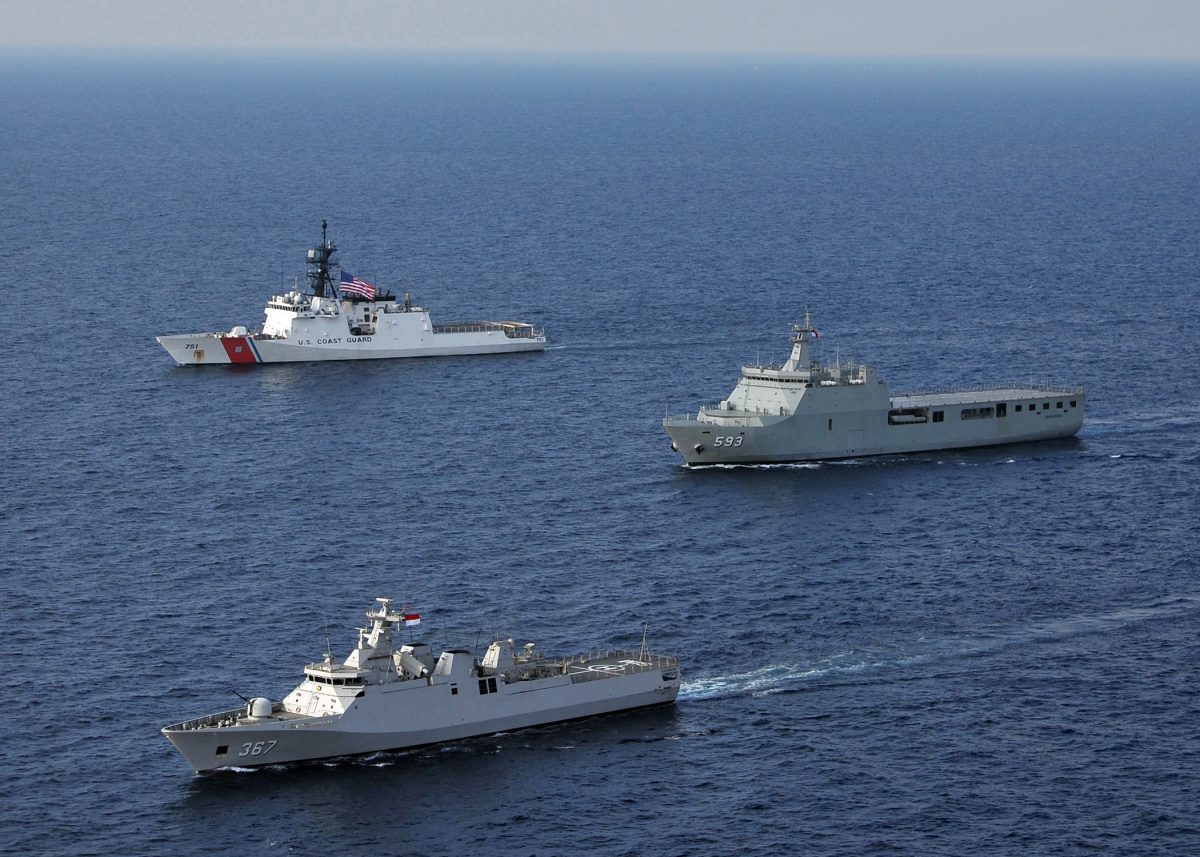 Indonesian and U.S. Coast Guard ships transiting the Java Sea during exercises