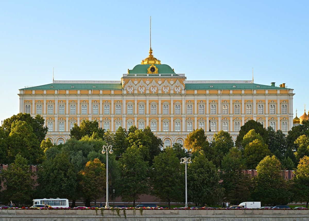 The Grand Kremlin Palace along the Moscow River at sunset
