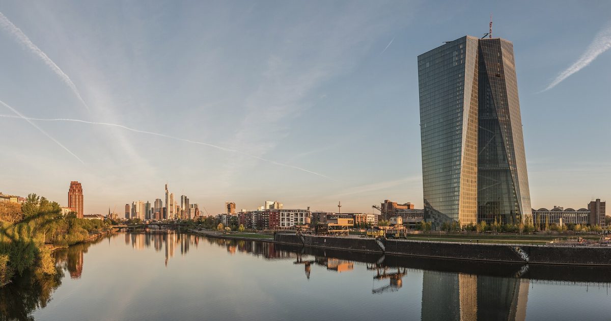 The European Central Bank headquarters and Frankfurt skyline at dawn