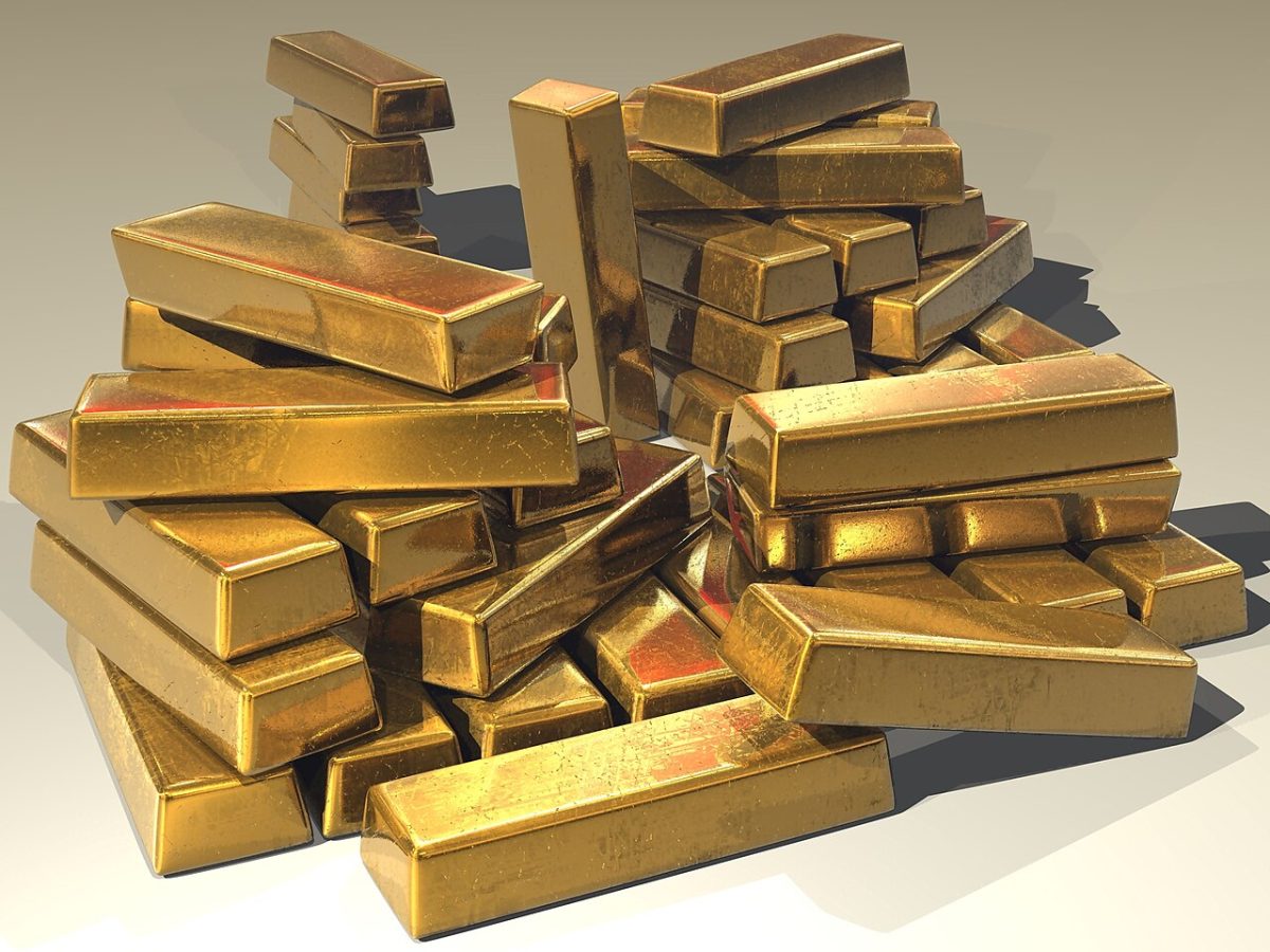 Gold bullion bars representing falling gold prices